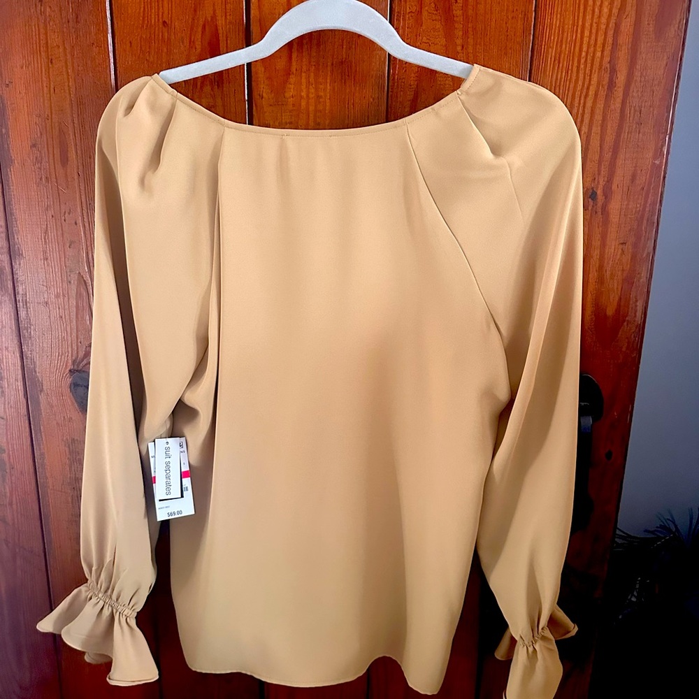XS , Beautiful gold blouse, New with tags, never worn. Smoke free home.